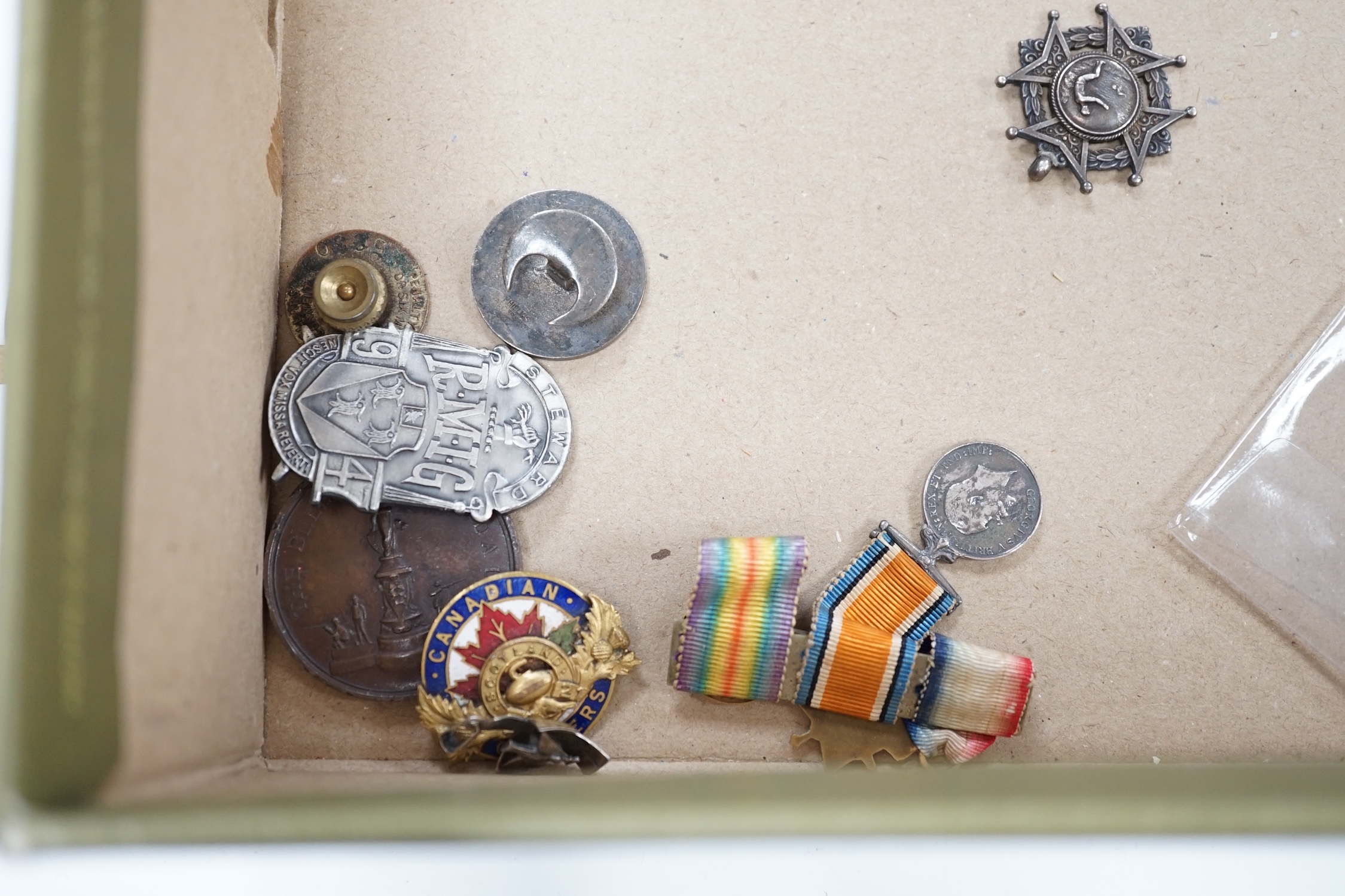 Three First World War medal trios awarded to; Pte. W.C. Belfrage 3rd Canadian MTD Rifles, Cpl. R.W. Wells R.F.A. and Pte. F.G. Walker R.A.M.C. together with two additional British war medals, two miniature metal groups,